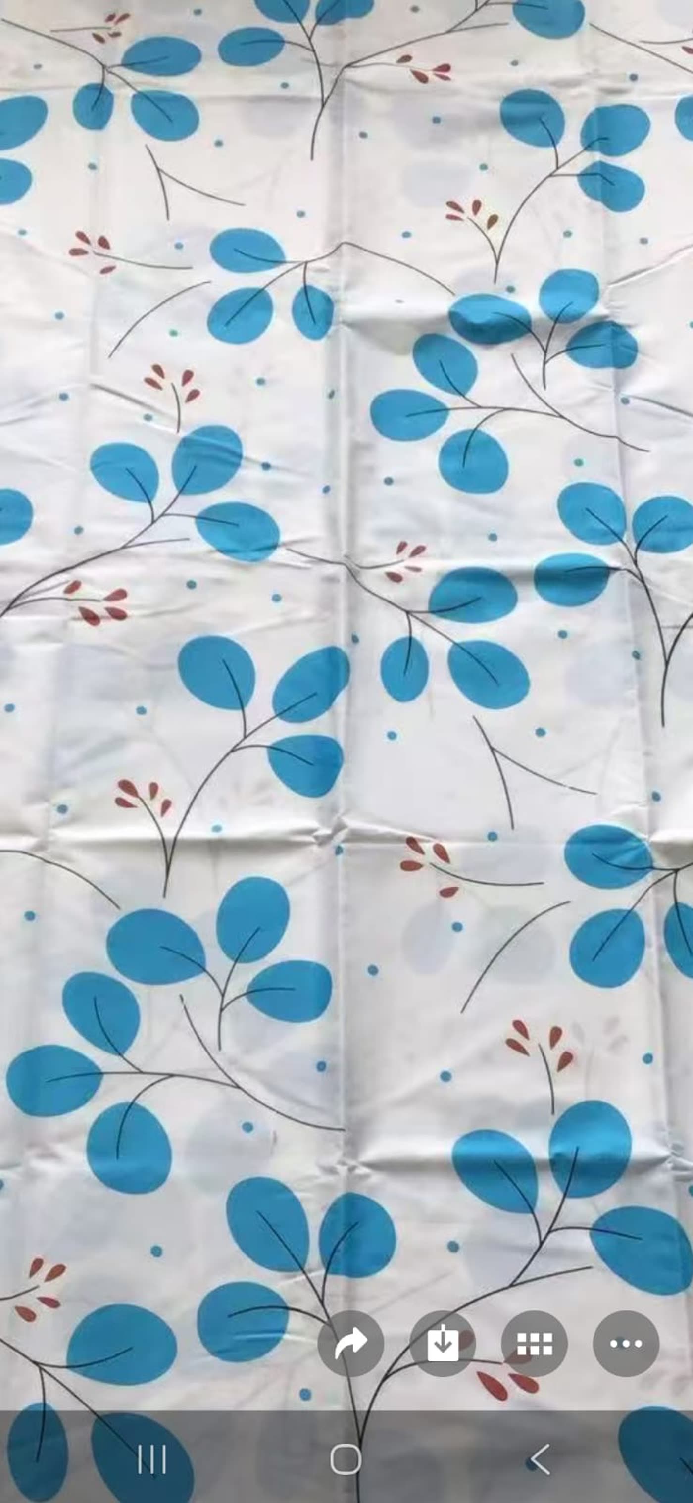 Blue leaf print fabric swatch
